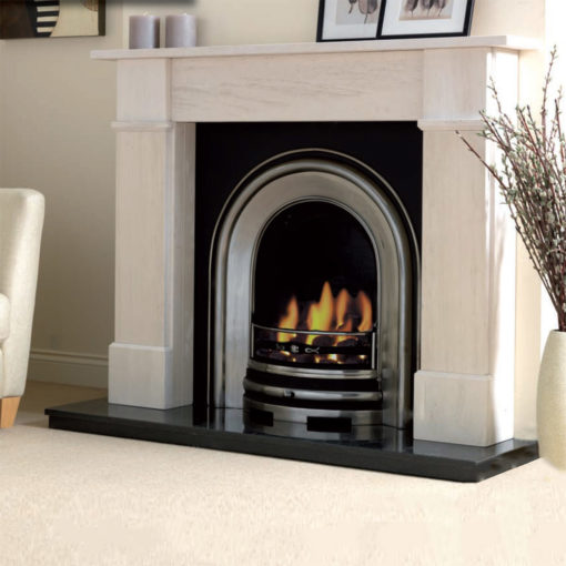 Evora limestone fireplace shown with a cast iron insert and gas fire