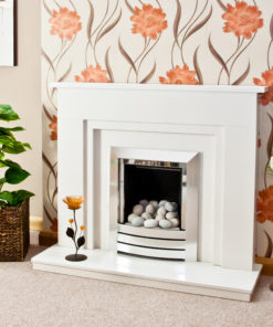 Stepped Wendle marble fireplace in a Blanco Micro marble. Shown with a full depth gas fire and pebble fuel bed