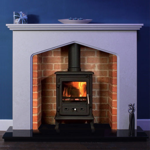 Thetford marble fireplace shown in Italian Verona grey marble with a wood burning stove